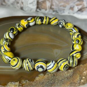 NATURAL YELLOW AND BLACK MALACHITE ROUND STRETCH BRACELET